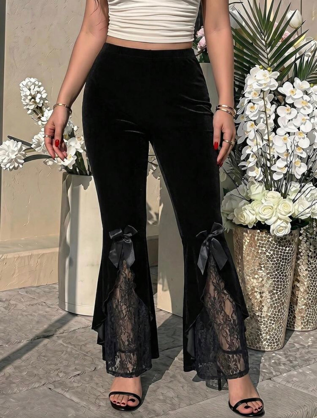 White lace flare trousers front view